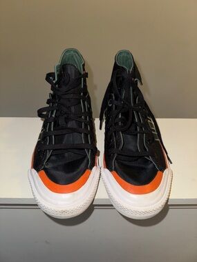 Addidas Black High-Top Sneakers with Orange Toe Accent